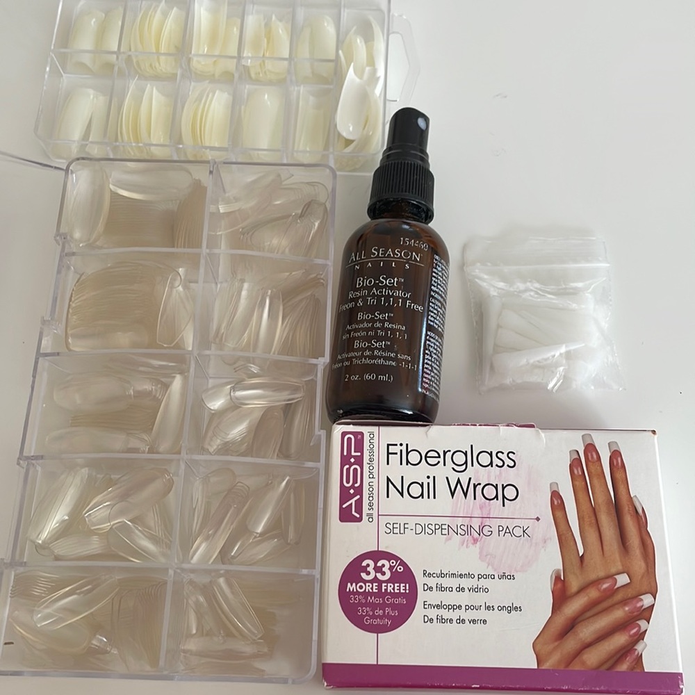 Nail tips, fiberglass nail wrap, resin activator